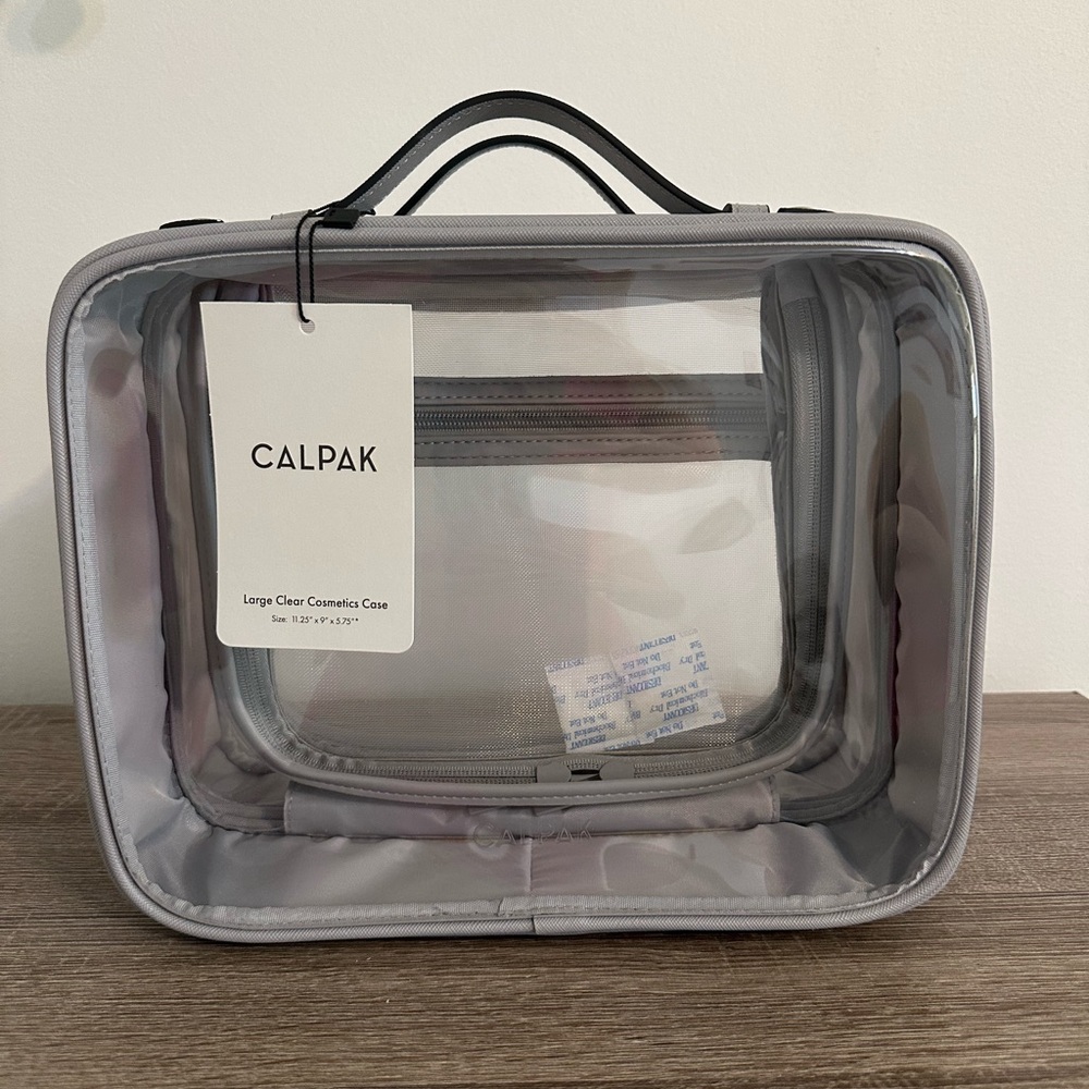 Calpak Large Cosmetic Clear Case in Gray NWT!